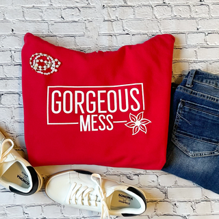 This is the Gorgeous Mess Hoodie in the color red. The brand is an Independent.